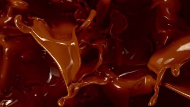 超级慢镜头飞溅融化巧克力背景1000 Fps 用4K解像度的高速电影摄影机拍摄 — 图库视频影像