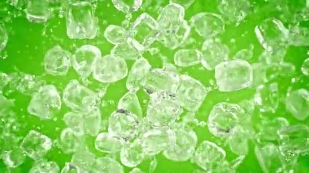 Super Slow Motion Shot Ice Cubes Explosion Camera Green Background — Stock video