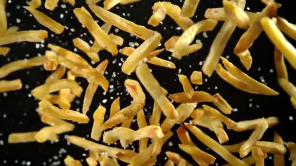 Super Slow Motion Shot French Fries Salt Flying Camera Isolado — Vídeo de Stock