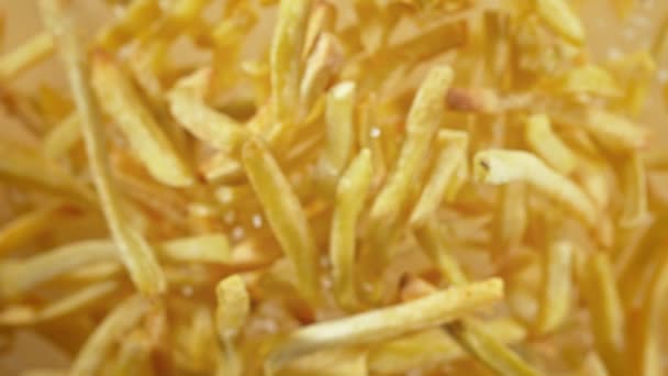 Super Slow Motion Shot French Fries Grain Salt Flying Camera — Stock video
