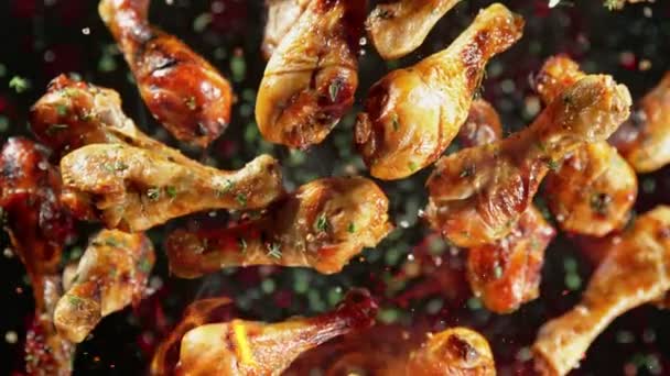 Super Slow Motion Shot Grilled Spicy Chicken Drumsticks Flying Camera — Stock Video