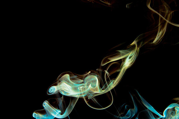 Colored smoke on a black background