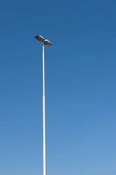 Lamppost at parking of gasstation on highway — Stock Photo, Image