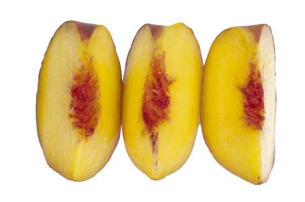 Three peach slices in a row — Stock Photo, Image