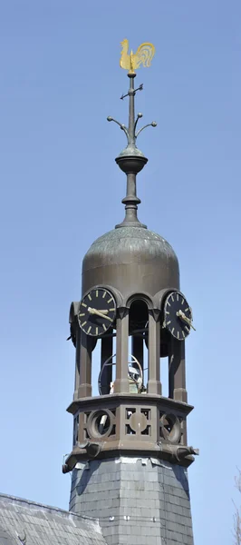 Octagonal belfry with clocks, dome weathercock — Stock Photo, Image