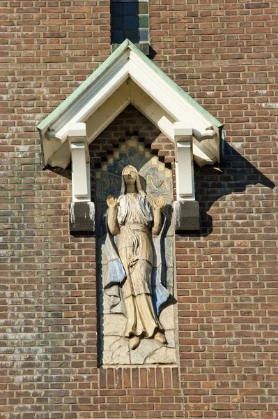 Statue of holy Mary on Church tower — Stock Photo, Image