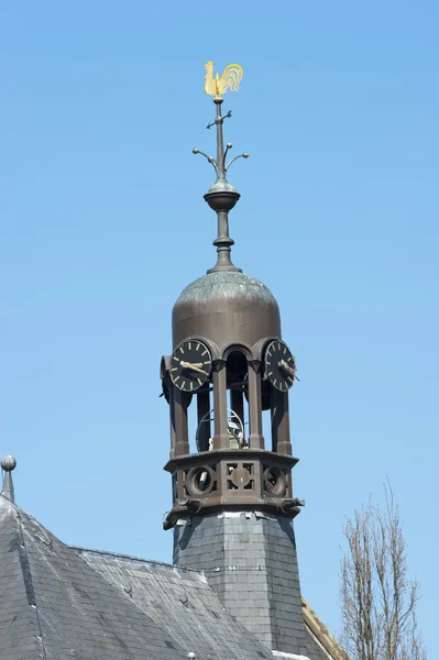 Octagonal belfry with clocks and weathercock — Stock Photo, Image