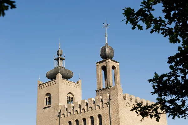 Decorated monastery towers with battlements — Stock Photo, Image