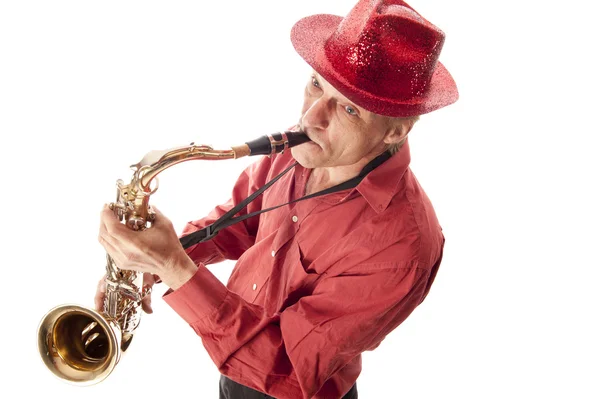 Hombre con sombrero tocando el saxofón — Foto de Stock