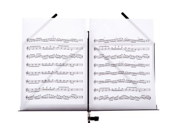 music stand with melody sheets clipart