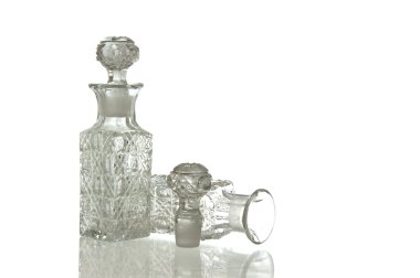 Two decorative glass carafe and plug clipart