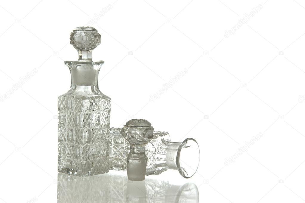 Two decorative glass carafe and plug