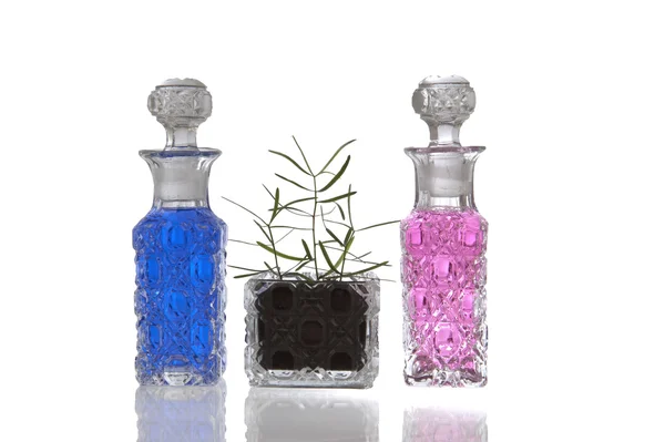 Blue pink crystal glass bottles — Stock Photo, Image