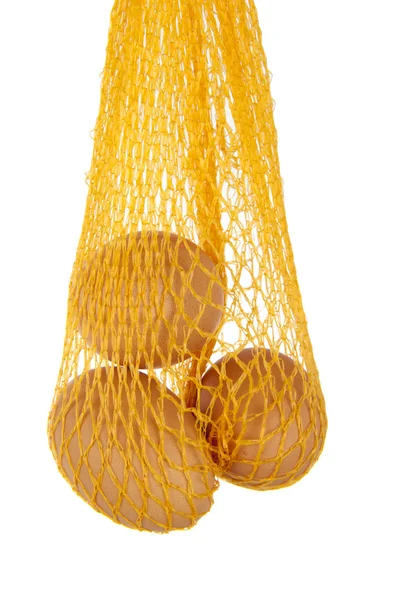 Yellow net with three eggs — Stock Photo, Image