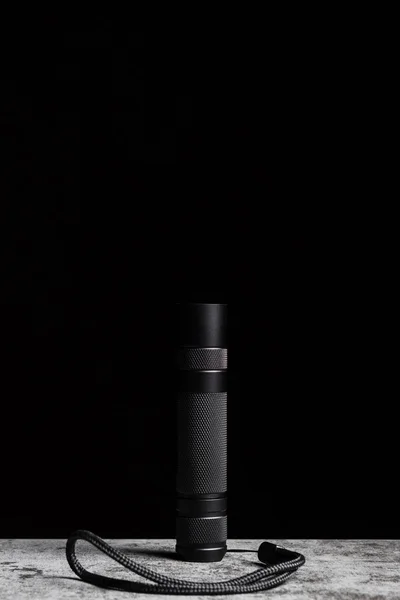 Flashlight Stands Table Black Background Vertical Copy Space — Stock Photo, Image