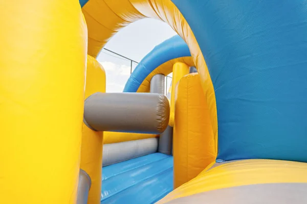 Inflatable obstacle course for children games or team building outdoor activities.