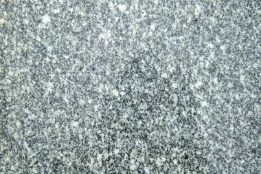 Background or texture of simple grey granite.