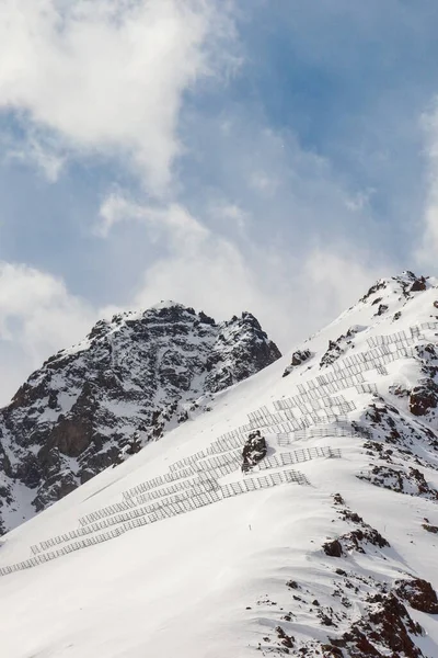 Snowy Rocky Mountains Avalanche Protection Barriers Vertical Copy Space — Photo