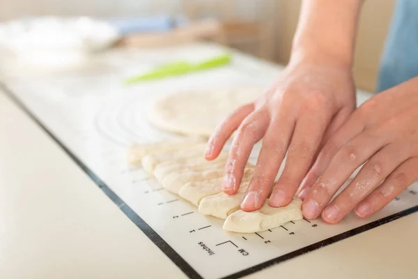 Silicone baking mat with inch and metric markings for ease of use during the cooking process. Selective focus and copy space.