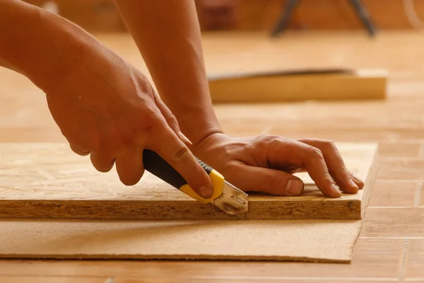 Side View Hands Carpenter Who Cuts Fiberboard While Making Furniture — Stock Photo, Image