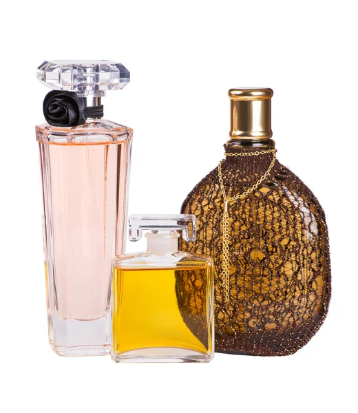 Trzy butelki perfum na białym tle — Zdjęcie stockowe