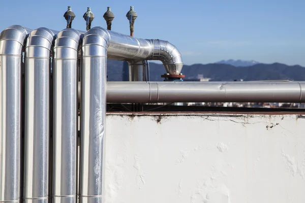 Silver tubes with securities valves. — Stock Photo, Image