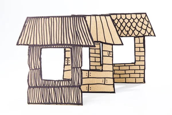 Соломинка, палочки и бриксы дома из картона . Стоковое Изображение