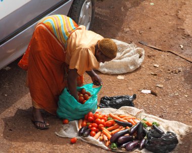 kadın Afrikalı Sebze satıcısı