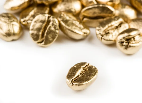 Guld kaffebönor — Stockfoto
