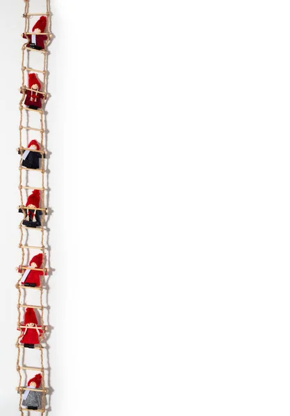 Christmas Vertical Card Dolls Climbing Rope Ladder Background Copy Space — Stock Photo, Image