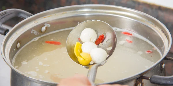 A ladle and glue pudding — Stock Photo, Image