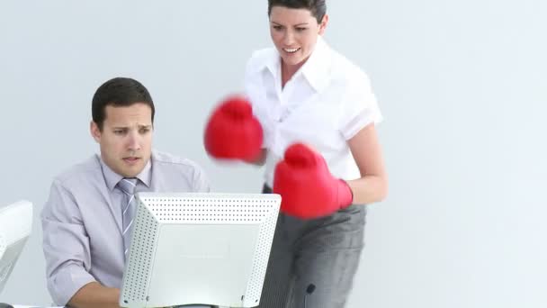 Competitive businesswoman hitting her colleague — Stock Video