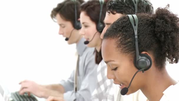 Competitive businesspeople working in a call center — Stock Video