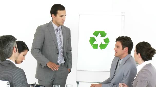 Confident businessman presenting the concept of recycling — Stock Video