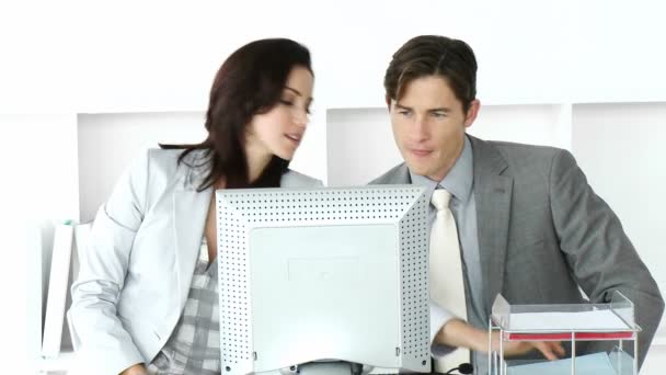 Two businesspeople working at a computer — Stock Video