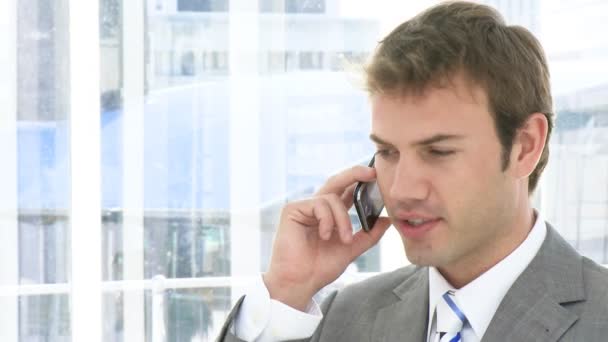 Self-assured business man on phone — Stock Video