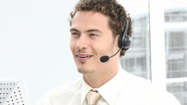 Young businessman with headset on — Stock Video