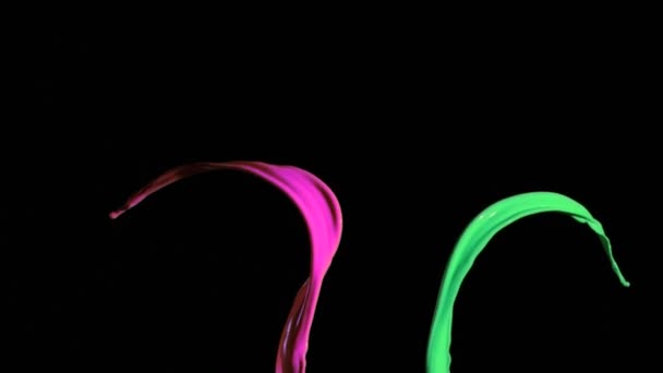 Pink and green paints in super slow motion mixing — Stock Video