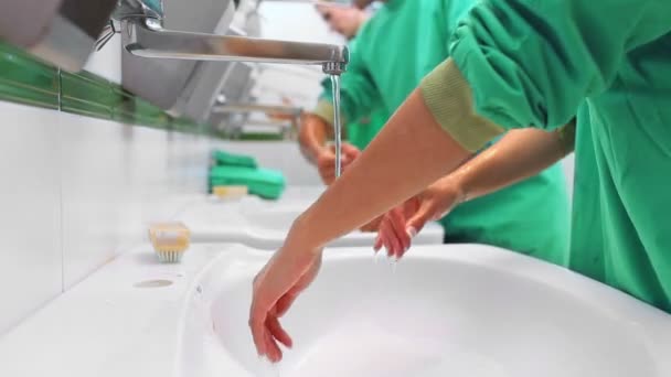 Surgical team washing hands — Stock Video