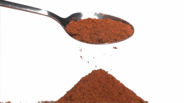 Slow motion of brown powder being poured — Stock Video