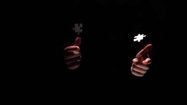 Hands taking apart jigsaw pieces — Stock Video