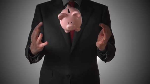 Man gooien een piggy bank — Stockvideo