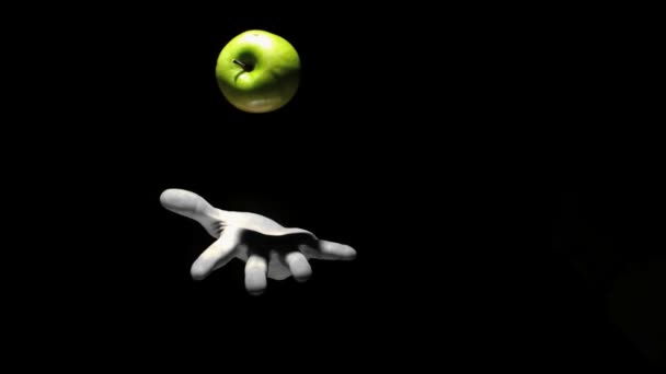 Hand throwing a green apple — Stock Video