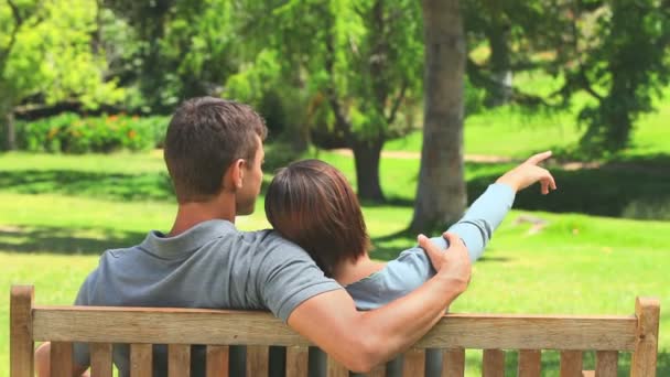 Young couple talking outdoors — Stock Video