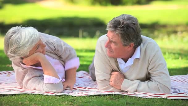 Elderly woman talking with her husband — Stock Video