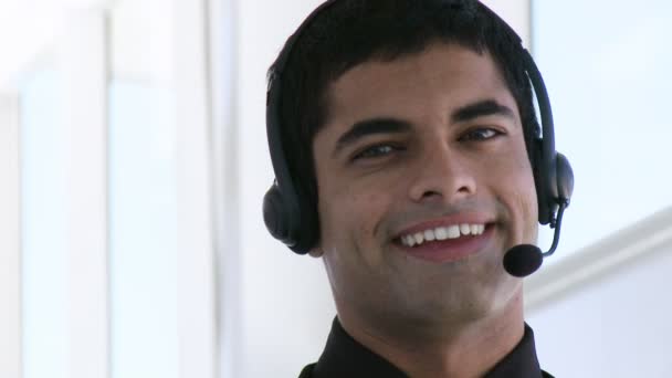 Hispanic Businessman with headphones on — Stock Video