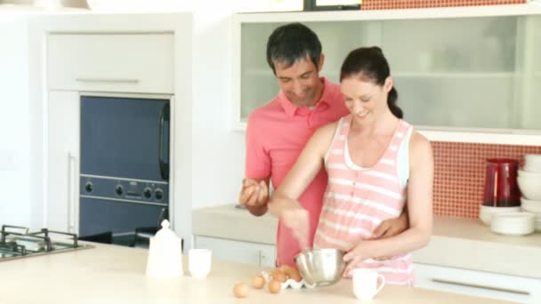 Young happy couple in the kitchen — Stock Video