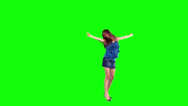 スローモーションで踊る幸せのブルネットの女性 — ストック動画