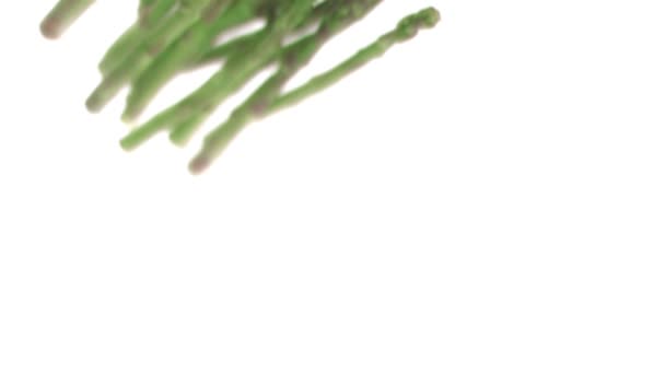 Asparagus falling in super slow motion — Stock Video