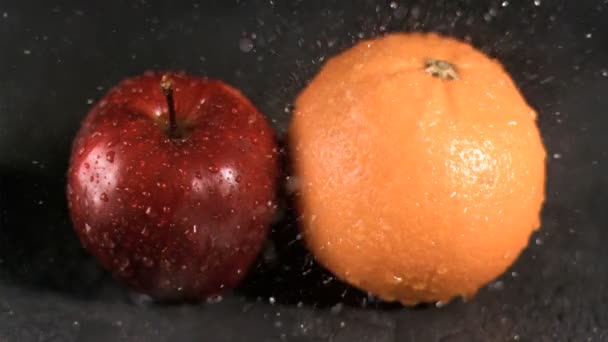 Water sprayed on fruits in super slow motion — Stock Video